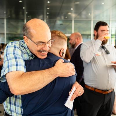 John and Andrew hugging